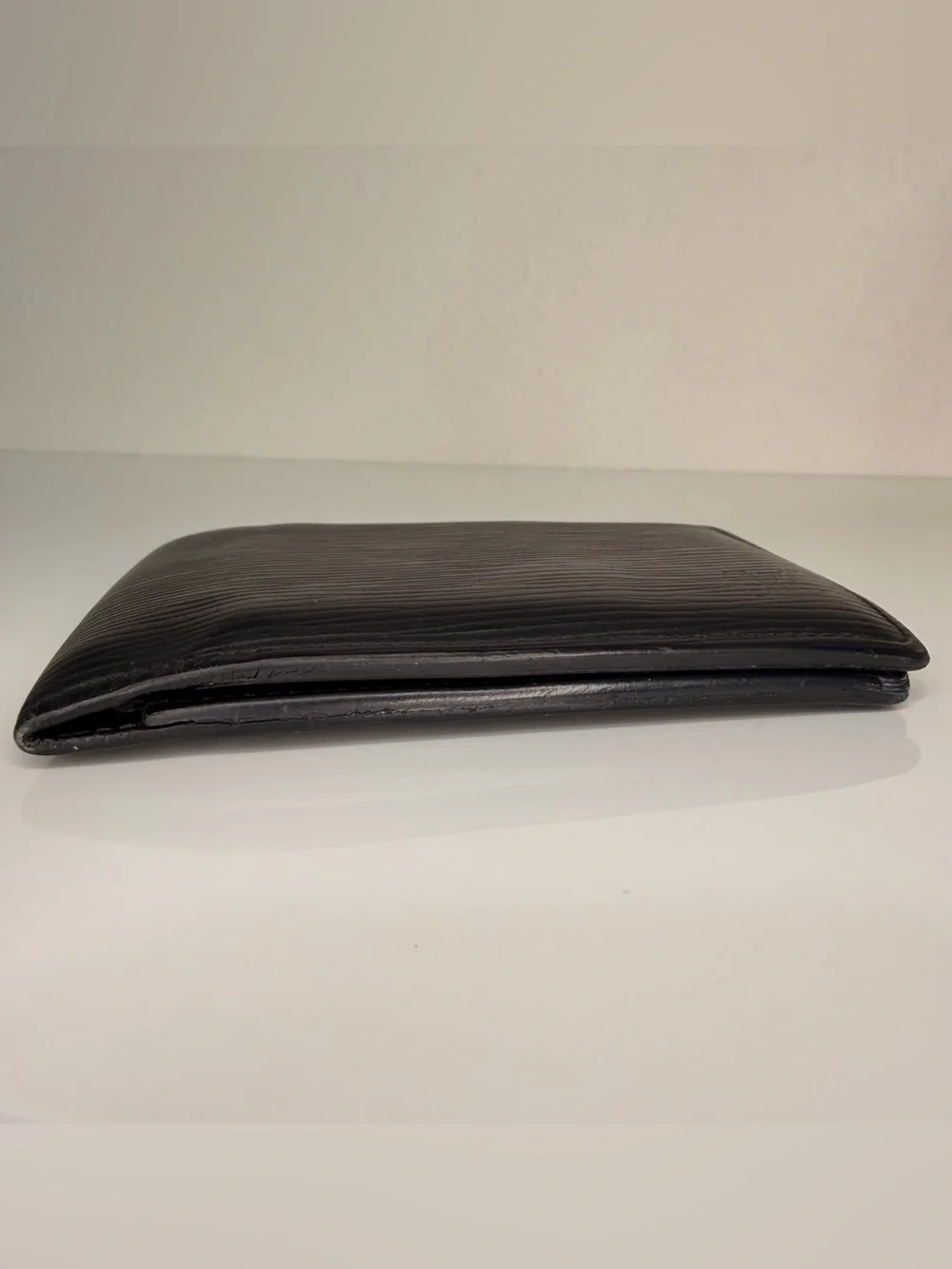 Authentic Louis Vuitton Black Epi Leather Bi-Fold Wallet